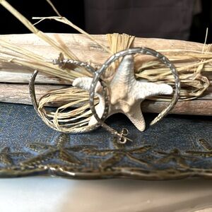 John Hardy sterling silver wave hoops.